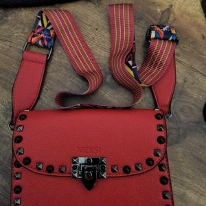 Mersin cross body bag. Never used no marks or stains. Cute bag